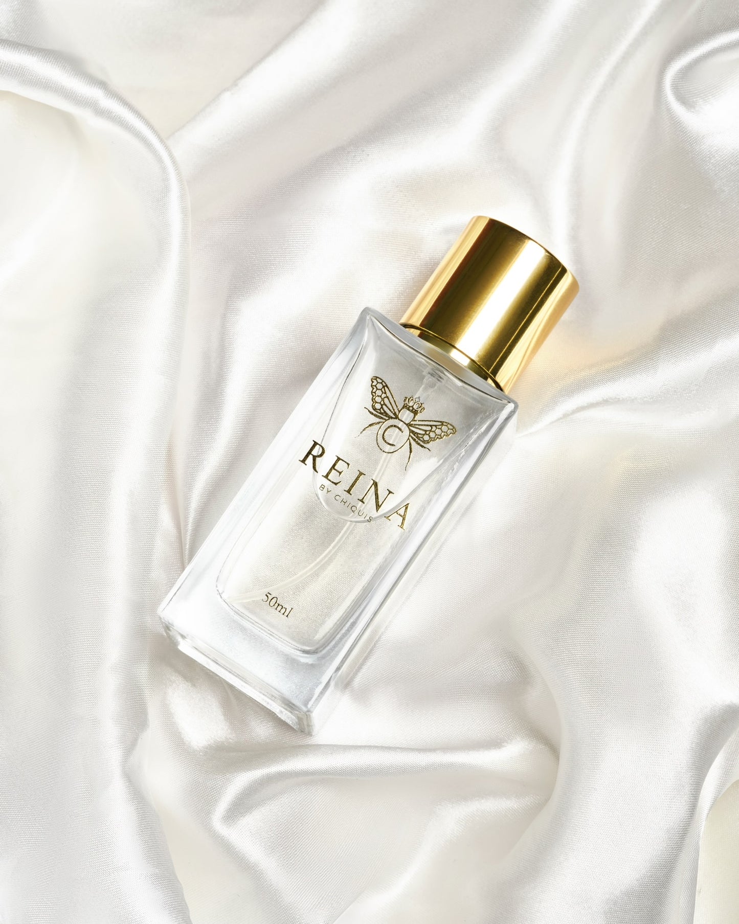 Reina Fragrance by Chiquis