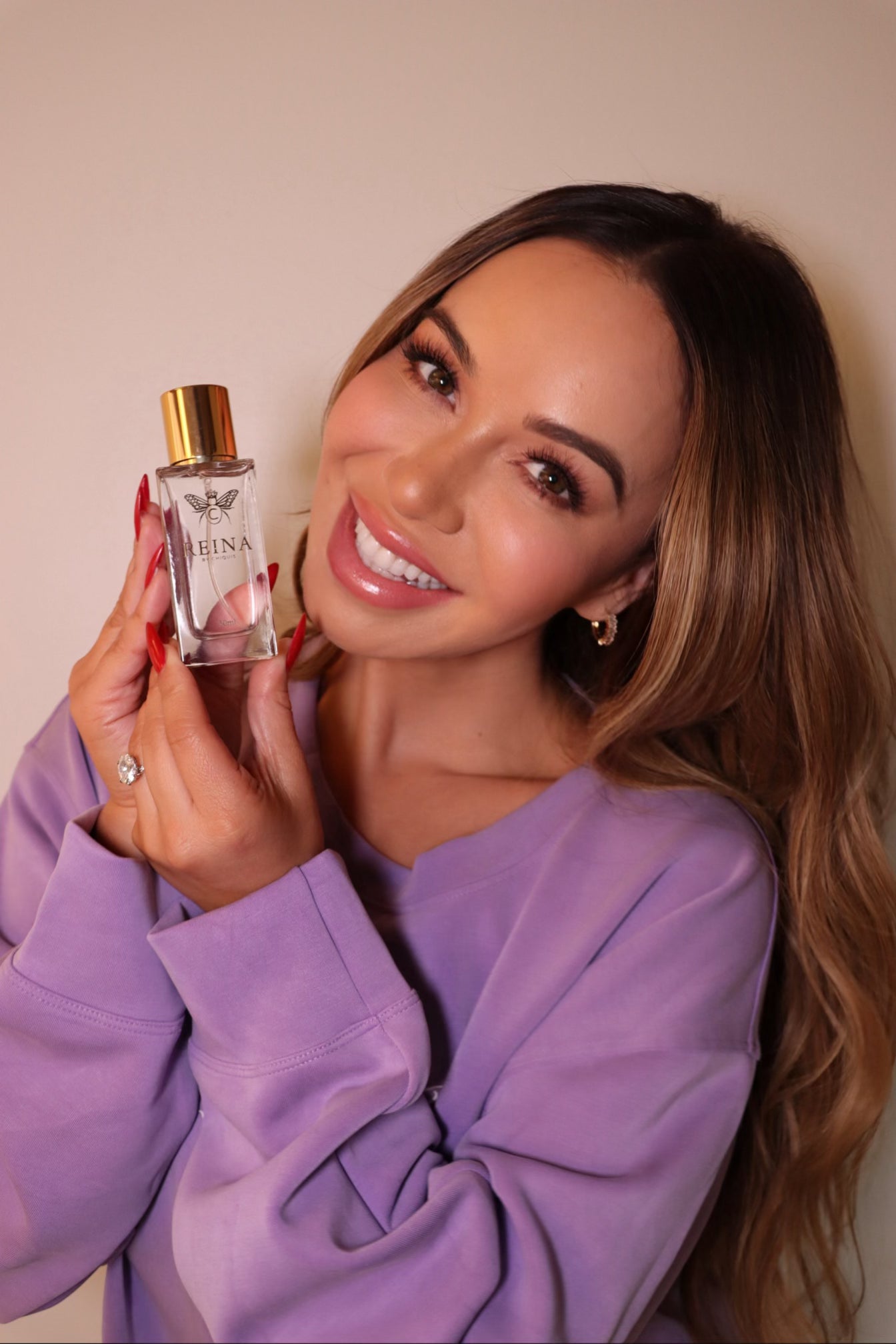 Reina Fragrance by Chiquis